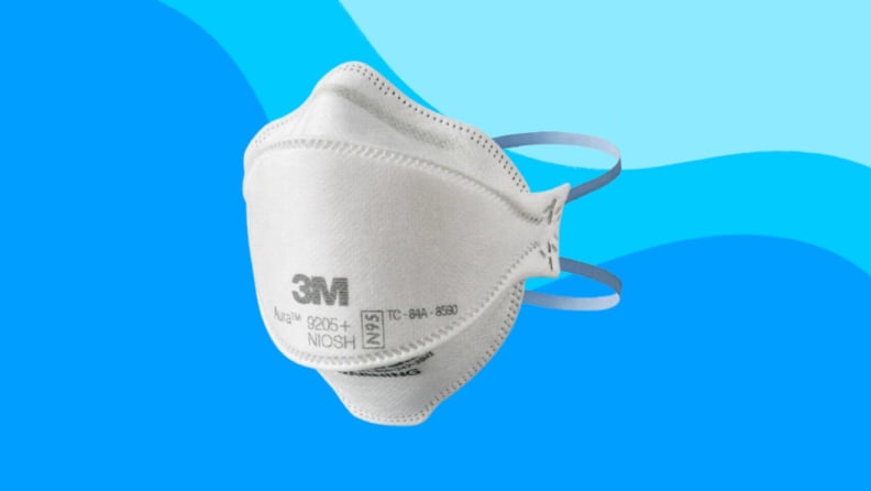 A KN95 mask against a blue background.