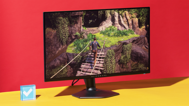 Nathan drake running along a rope bridge on a monitor