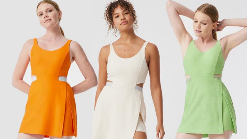 Three women wearing workout dresses in orange, cream, and green.