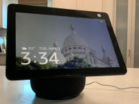 An Amazon Echo Show 10 sits on a table.