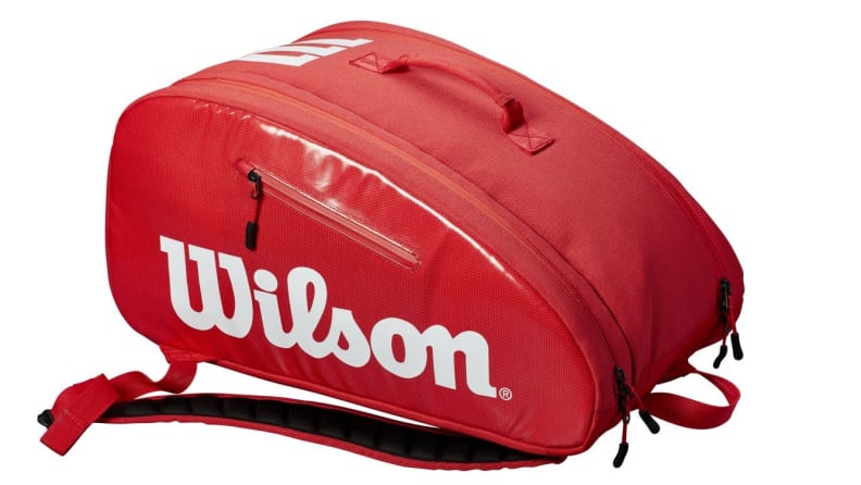 Red bag with Wilson white text on front on white background