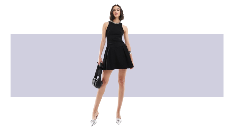 A black mini dress with embellishments along the neckline.