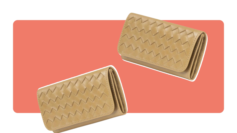 Two faux leather beige Deux Mains wallets with a zip-zag pattern on front.