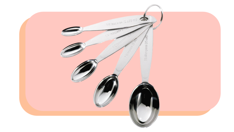 Stainless steel oval-shaped measuring spoons looped together by key ring.
