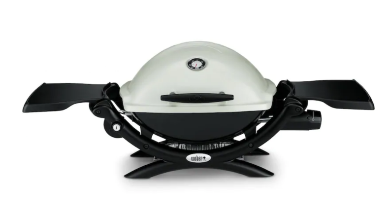 An image of a white portable grill with both trays extended.