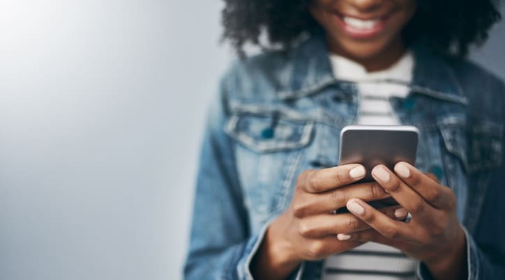 Woman holding mobile phone