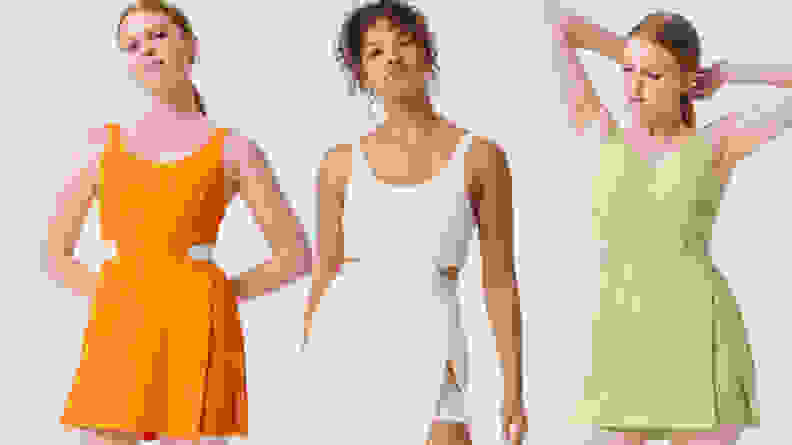 Three women wearing workout dresses in orange, cream, and green.