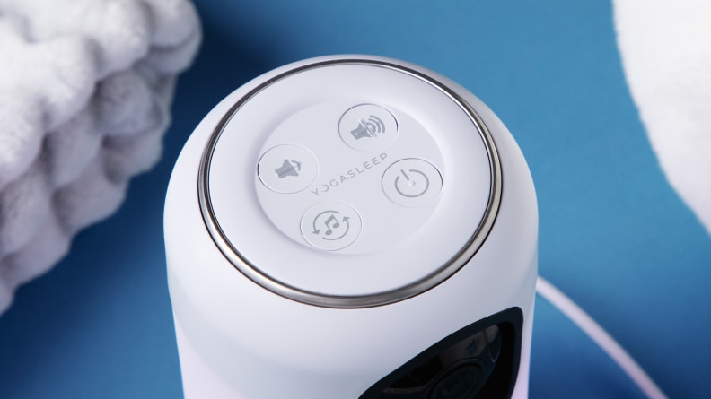 The top of the Yogasleep Ohma with four buttons for sound and light control