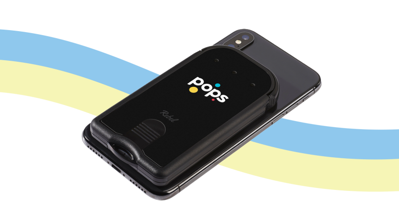 Pops Rebel Glucose Monitor on a rainbow background