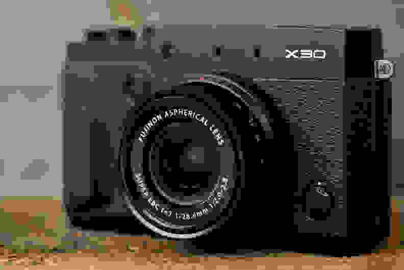 A photo of the Fujifilm X30's front face.