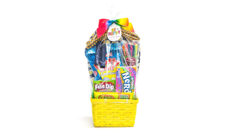 A yellow Be Hoppy basket includes jump rope, water balloons, and candy.