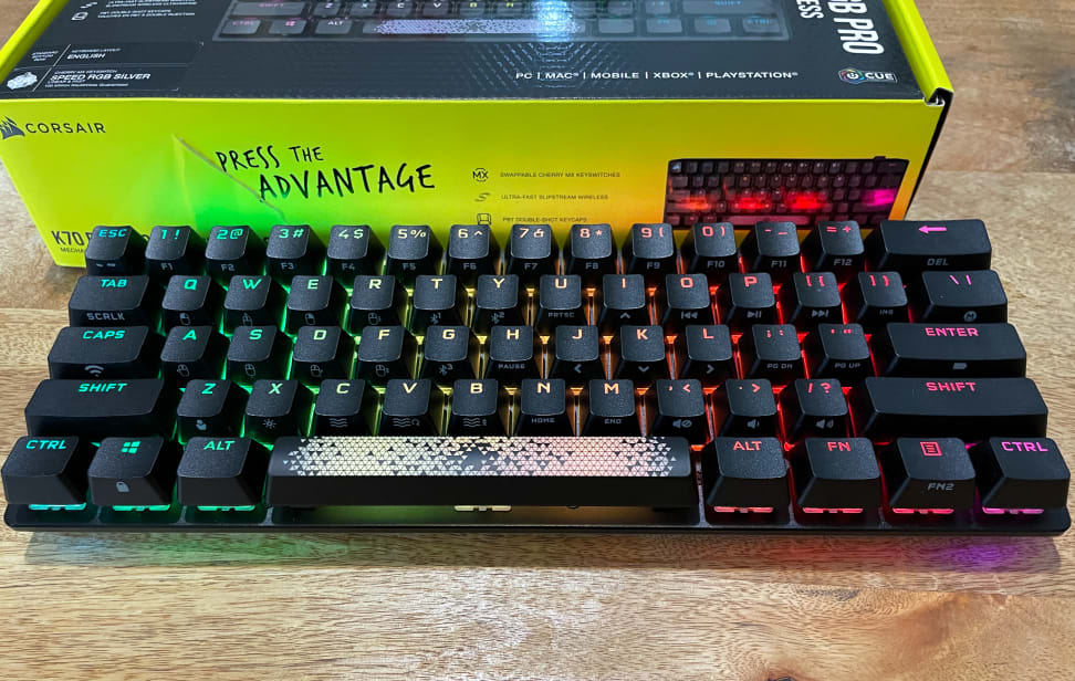 An overhead shot of a small keyboard with black keys.