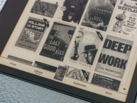 Close-up view of a Kindle display menu with various book covers.