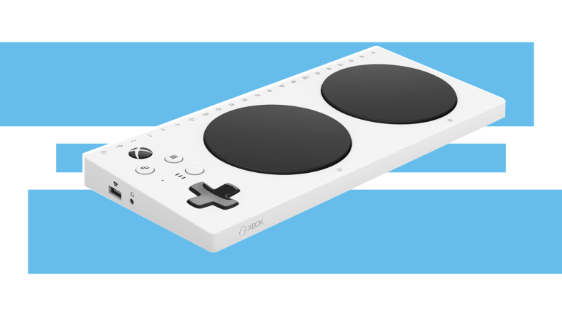 The Microsoft Adaptive Controller hovering over a blue and white background.
