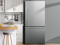 The fridge is installed in a bright, modern kitchen.