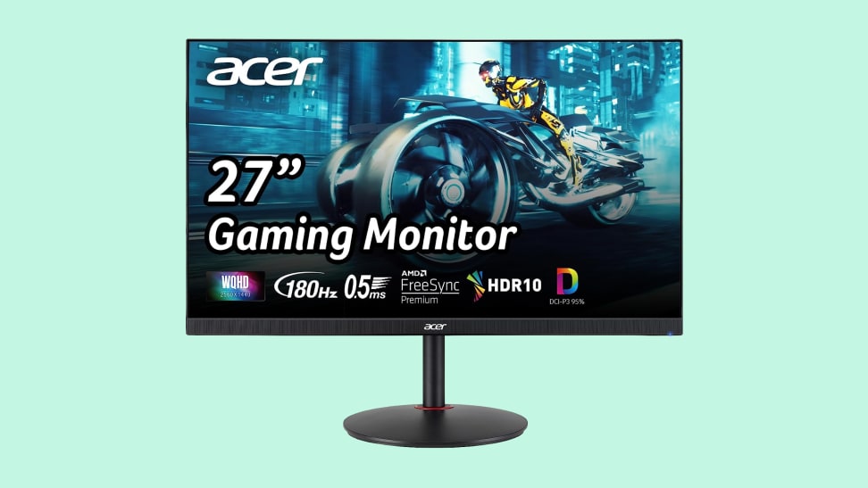An Acer Nitro gaming monitor on a green background.