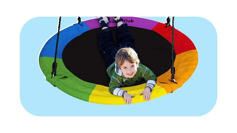 A Royal Oak Saucer sensory swing on a colorful background