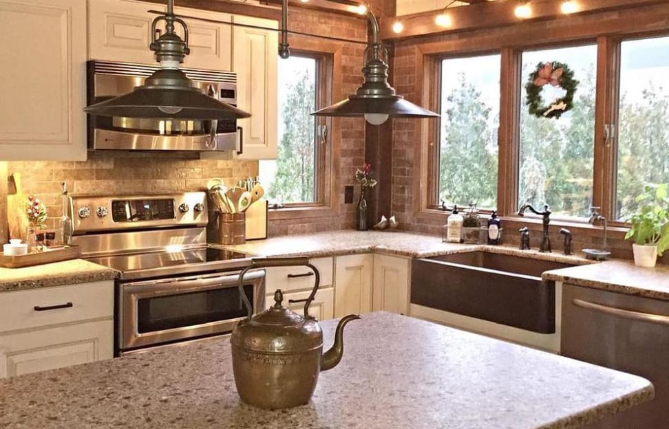 Kitchen with stainless appliances and copper sink