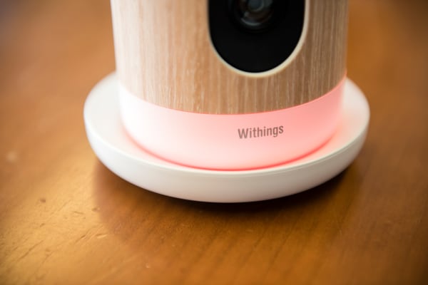 The Withings Home glowing red