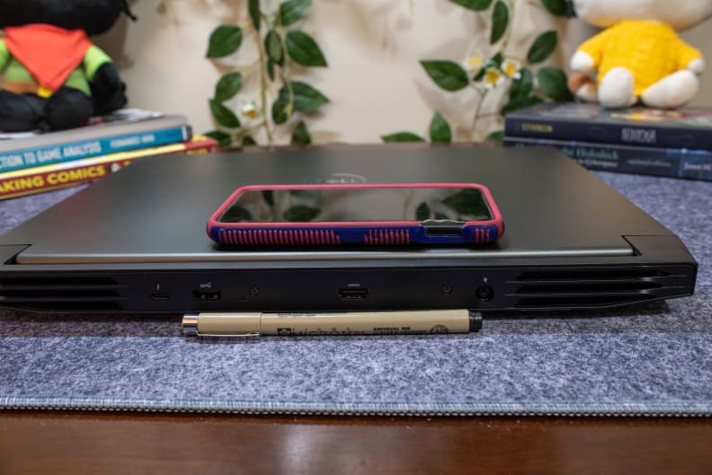 A thickness comparison of pen, laptop, and phone.