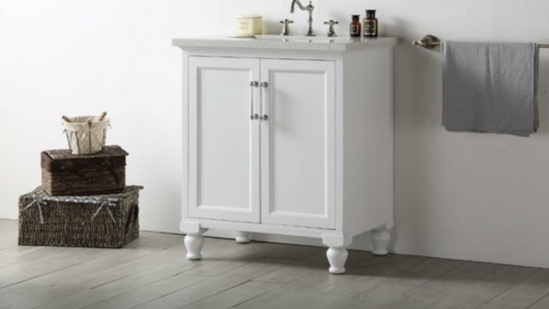 A white vanity with a quartz countertop is a clean look for the bathroom