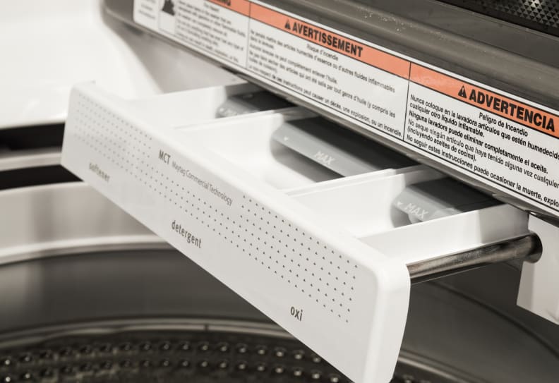Metal rails lets the detergent dispenser open smoothly.