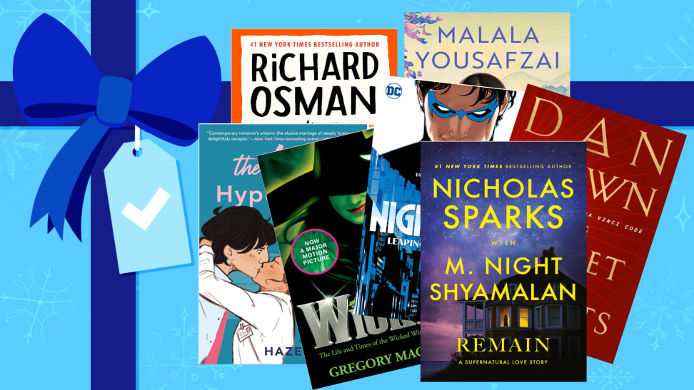 A pile of books on a blue gift background