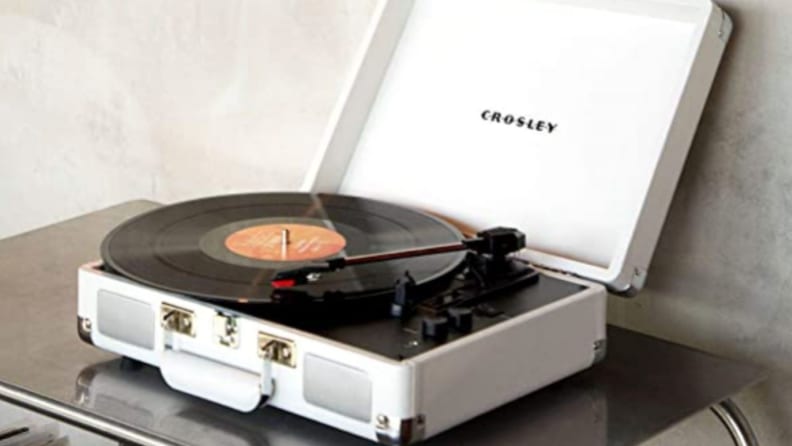 a crosley turntable in white on a tabletop