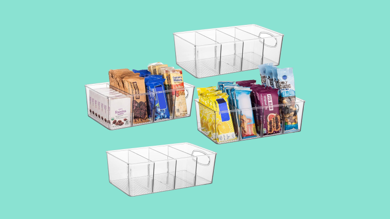 Four ClearSpace pantry organizers arrayed on a teal background, with the two in the center filled with snacks such as raisins, brownies, wafers, nuts, and fig bars.