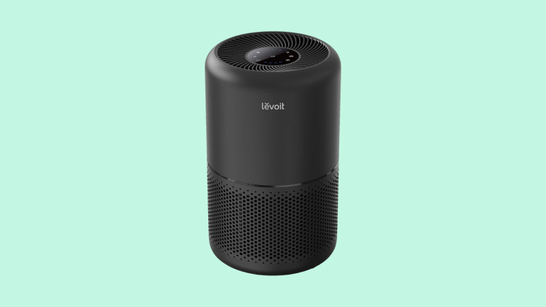 Product image of the Levoit Core 300 air purifier in black on a Reviewed background.