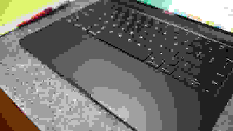 A closeup of the laptop trackpad.