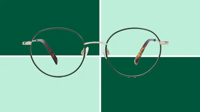 Warby Parker glasses on dark and light green background.