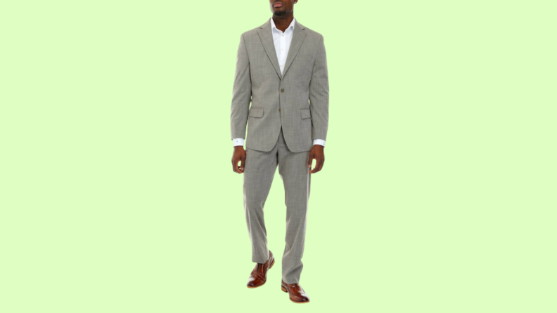 A model wearing a gray suit.