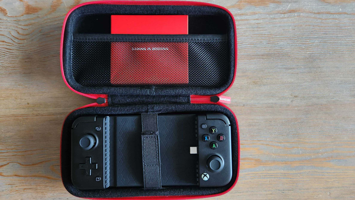 A mobile gaming controller inside of an open carrying case