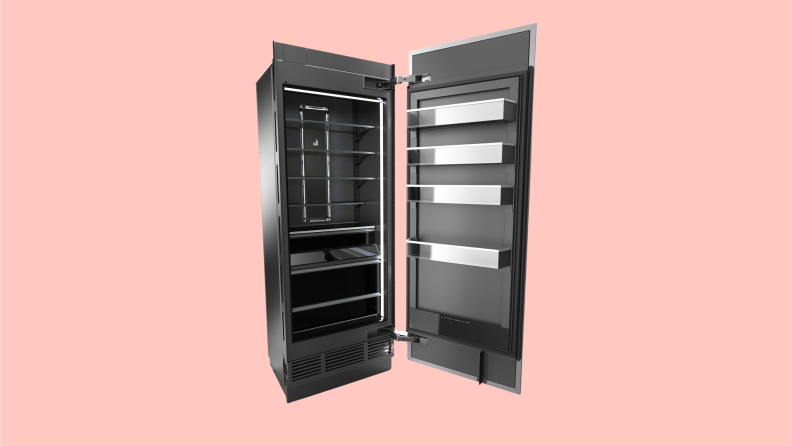Front view of the JennAir 30-inch SlimTech Column refrigerator in gray with its doors open revealing shelves while on a pink background.