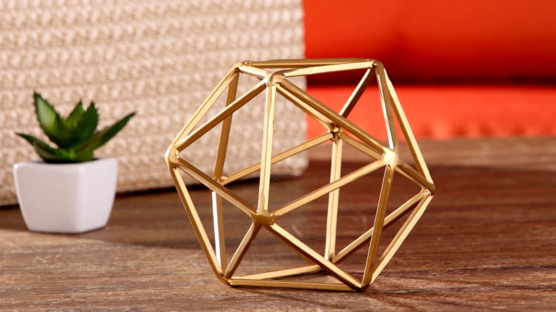 This cool geometric decoration would be a unique paperweight.