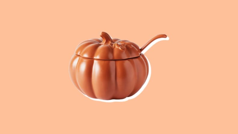 Orange pumpkin shaped tureen bowl with spoon ladel.
