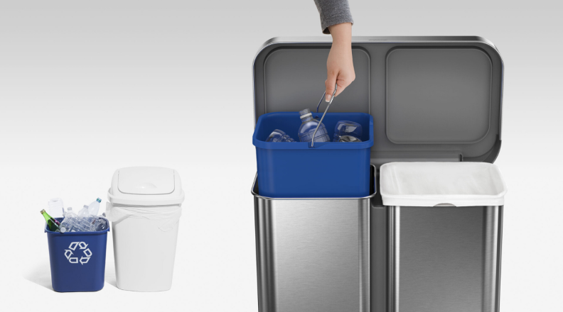 The Simplehuman dual trash can is show next to a regular trash can and a can of recycling.