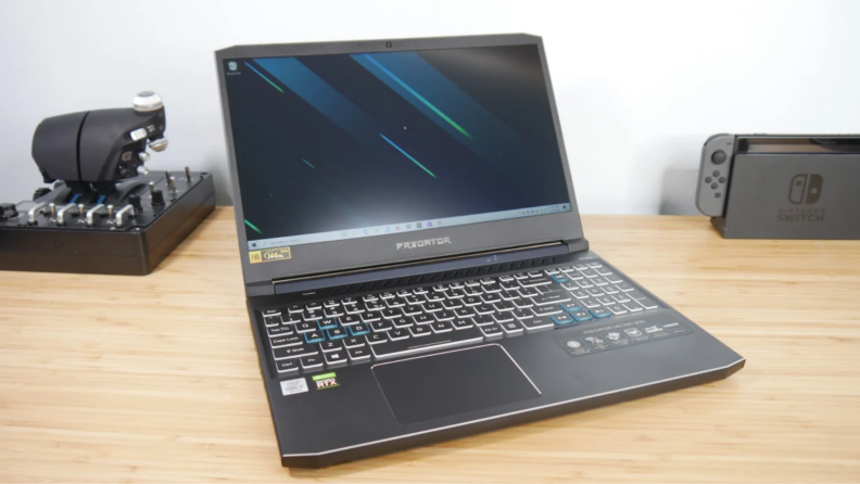 An image of a gray Acer Predator laptop open to a blank home page.