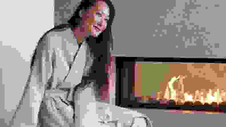 A woman enjoys her luxurious waffle robe