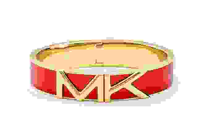 Red and gold bracelet with “MK” on it