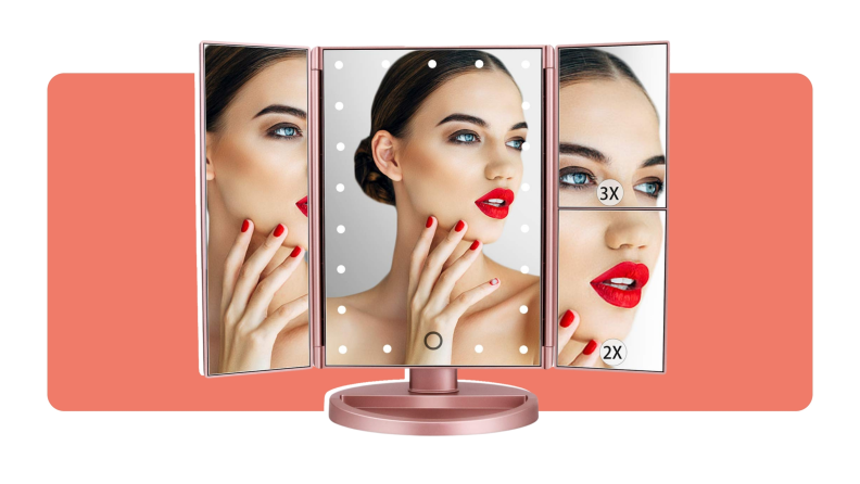 A model checks their polished makeup in the reflection of the Deweisn Lighted Makeup Mirror.
