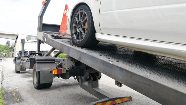 Car on a tow truck bed