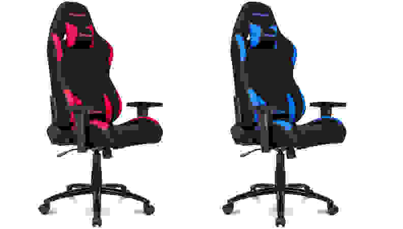 Left: red racing style gaming chair Right: blur racing style gaming chair on white background.