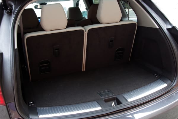 The 2014 Acura MDX's rear cargo area with all seats up,