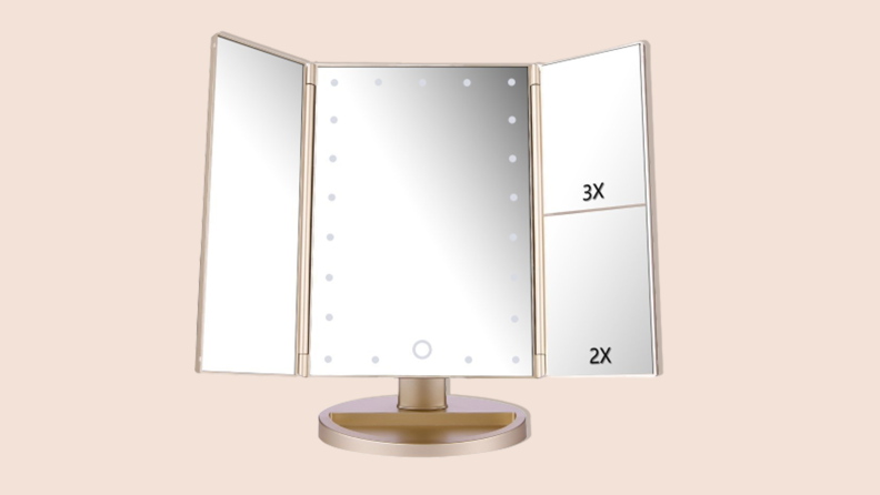 DeWeisn Tri-Fold Lighted Mirror on a tan background.