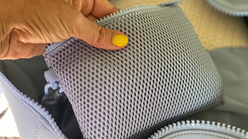 Close-up photograph of a mesh inner bag inside the Dagne Dover Landon Carryall.