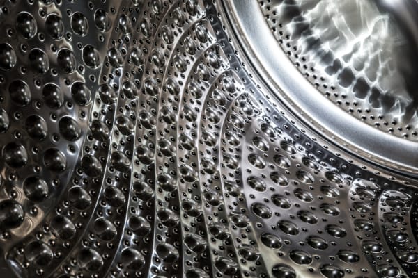 The steel pattern helps clean your clothes without destroying them.