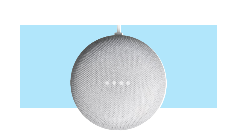 A Google Nest Mini smart speaker on a colorful background