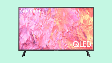 A Samsung Q60B Smart TV on a green background.